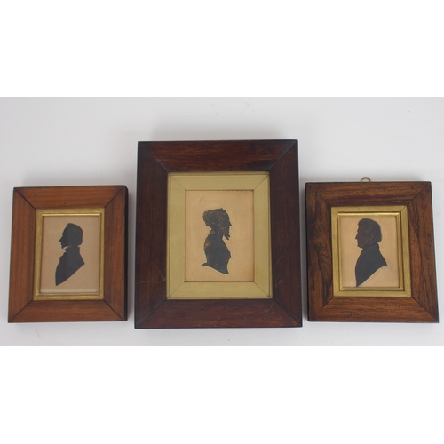 657 - THREE 19TH CENTURY BUST LENGTH SILHOUETTEScomprising a lady in a bonnet, 24 x 21cm overall and two o... 