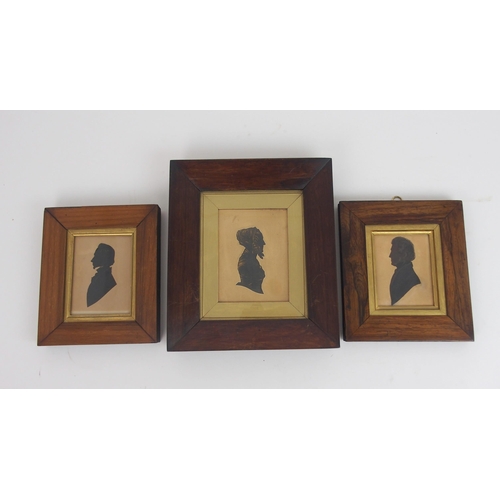 657 - THREE 19TH CENTURY BUST LENGTH SILHOUETTEScomprising a lady in a bonnet, 24 x 21cm overall and two o... 