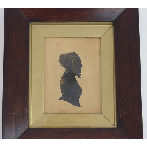 657 - THREE 19TH CENTURY BUST LENGTH SILHOUETTEScomprising a lady in a bonnet, 24 x 21cm overall and two o... 