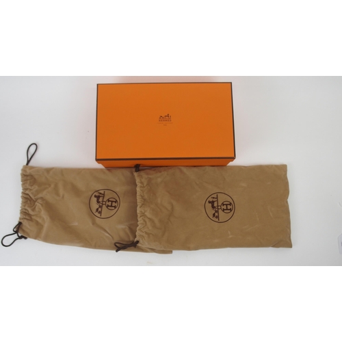 668 - A PAIR OF HERMES LADIES BROWN SUEDE LOAFERSsize 39, unused, in original box