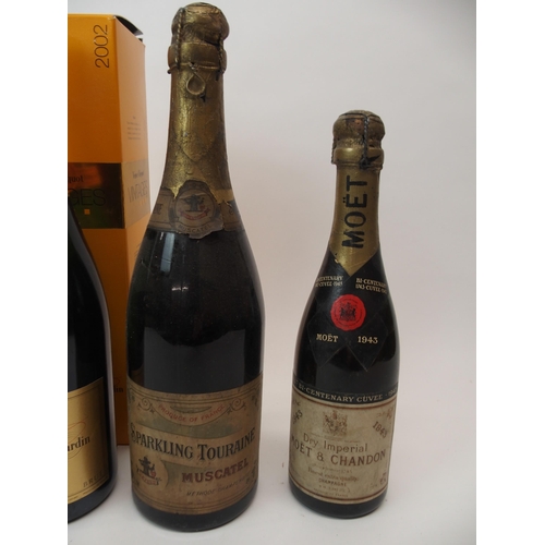 703 - A BOTTLE OF VEUVE CLICQUOT, 200212% vol, 750ml, Moet & Chandon Petite Liquorelle, three half bot... 