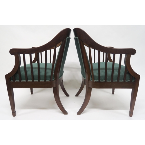 10 - A PAIR OF VICTORIAN MAHOGANY FRAMED LIBRARY CHAIRSwith floral mother of pearl inlays, down swept arm... 