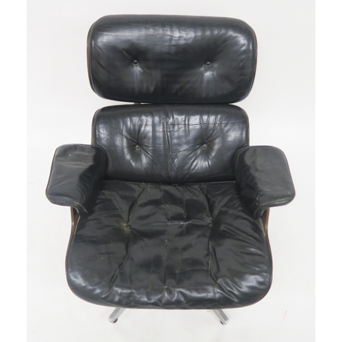 101 - A MID 20TH CENTURY AFTER CHARLES AND RAY EAMES FOR HERMAN MILLER LOUNGE CHAIR AND STOOLwith black le... 