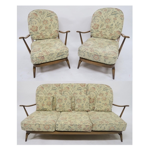 105 - A MID 20TH CENTURY ELM AND BEECH ERCOL THREE PIECE SUITEcomprising three seater settee, 78cm high x ... 