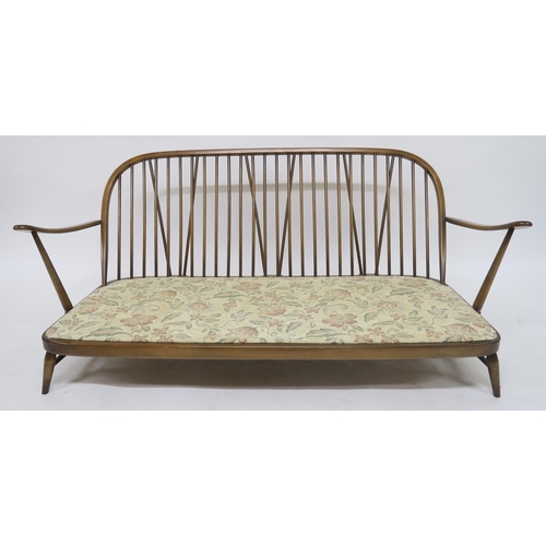 105 - A MID 20TH CENTURY ELM AND BEECH ERCOL THREE PIECE SUITEcomprising three seater settee, 78cm high x ... 