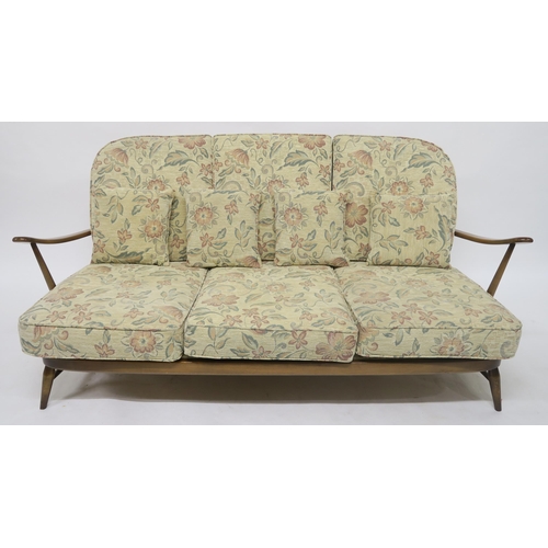 105 - A MID 20TH CENTURY ELM AND BEECH ERCOL THREE PIECE SUITEcomprising three seater settee, 78cm high x ... 