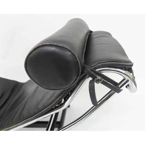 108 - A 20TH CENTURY CHROME AND BLACK LEATHER UPHOLSTERED CHAISE LOUNGE IN THE MANNER OF LE CORBUSIERon a ... 