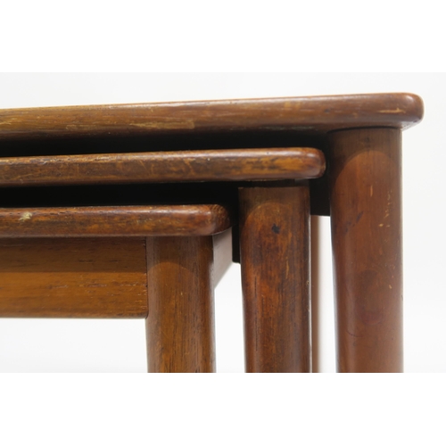 114 - A MID 20TH CENTURY POUL JEPPESEN, DENMARK TEAK NEST OF THREE TABLESwith rectangular tops on stretche... 