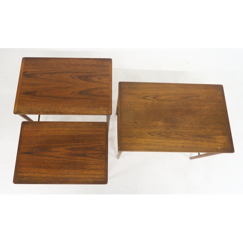 114 - A MID 20TH CENTURY POUL JEPPESEN, DENMARK TEAK NEST OF THREE TABLESwith rectangular tops on stretche... 