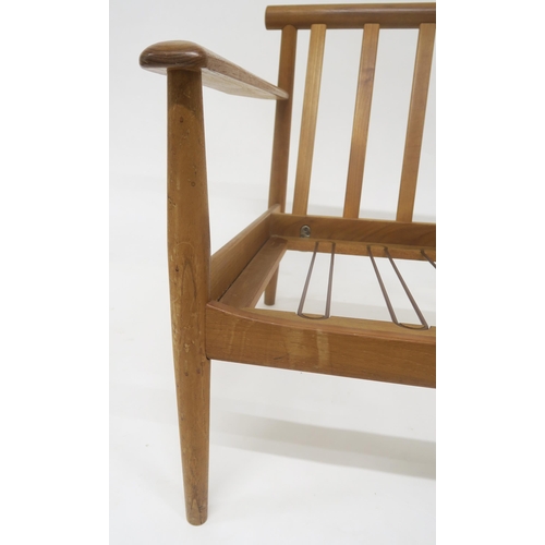 117 - A MID 20TH CENTURY TEAK GRETE JALK FOR FRANCE & SON EASY CHAIRwith rail back seat on turned tape... 