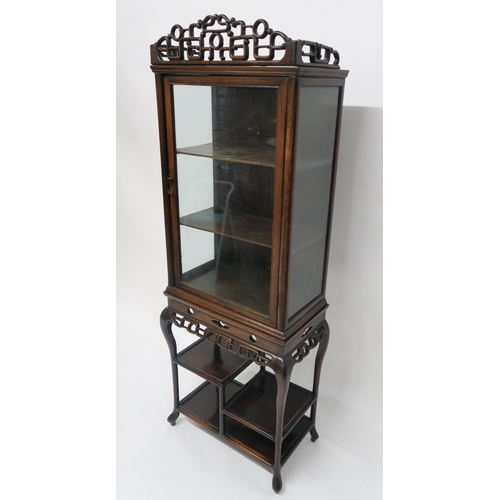 19 - A 19TH CENTURY CHINESE HARDWOOD GLAZED DISPLAY CABINET ON STANDwith carved fretwork cornice and frie... 