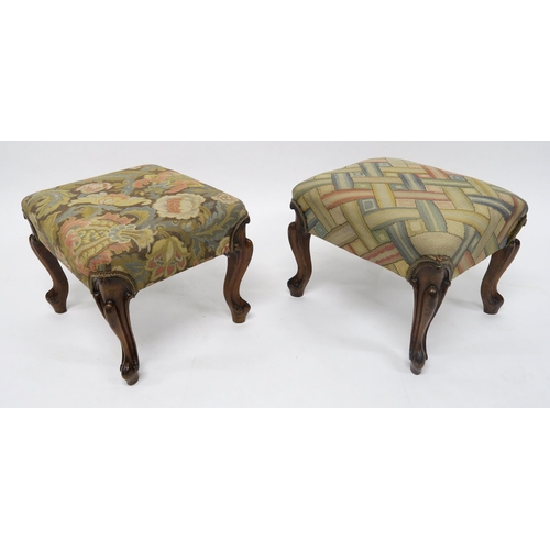 31 - A PAIR OF VICTORIAN UPHOLSTERED FOOTSTOOLSwith carved walnut cabriole supports, 35cm high x 43cm wid... 