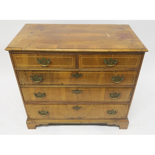 37 - A GEORGIAN WALNUT AND SATINWOOD INLAID TWO OVER THREE CHEST OF DRAWERSon bracket feet, 84cm high x 9... 
