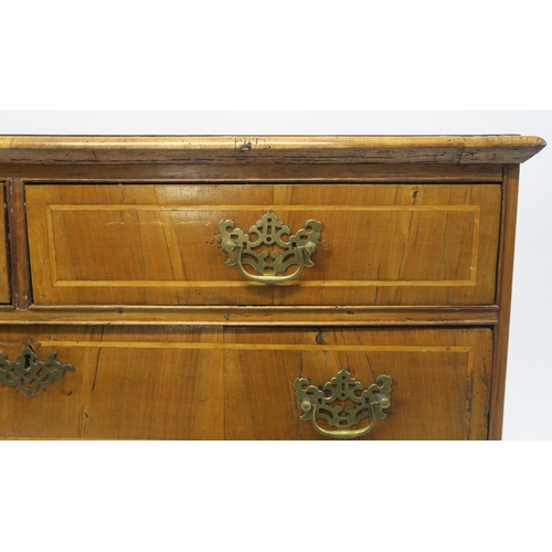 37 - A GEORGIAN WALNUT AND SATINWOOD INLAID TWO OVER THREE CHEST OF DRAWERSon bracket feet, 84cm high x 9... 