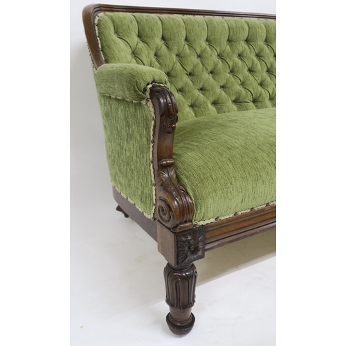 53 - A VICTORIAN ROSEWOOD FRAMED BUTTONBACK PARLOUR SETTEEwith green upholstery on turned supports, 85cm ... 