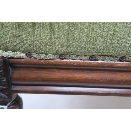 53 - A VICTORIAN ROSEWOOD FRAMED BUTTONBACK PARLOUR SETTEEwith green upholstery on turned supports, 85cm ... 