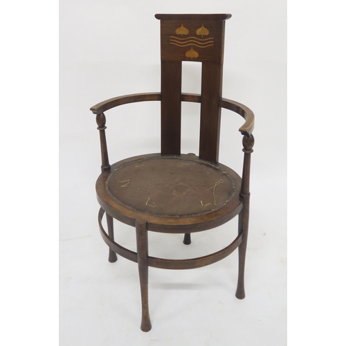 57 - A LATE VICTORIAN ARTS AND CRAFTS J.S. HENRY MAHOGANY FRAMED ARMCHAIRwith inlaid splat, curved open a... 