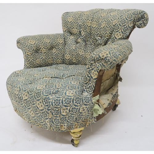60 - A 19TH CENTURY BUTTON BACK TUB ARMCHAIRupholstered in Howard & Sons monogram-print fabric on gil... 