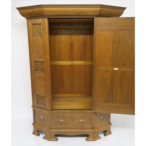 68 - AN EARLY 20TH CENTURY OAK SHAPLAND & PETTER BARSTABLE ARTS & CRAFTS WARDROBEwith moulded cor... 
