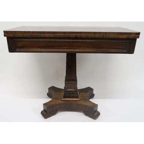 7 - A VICTORIAN ROSEWOOD FOLDOVER TEA TABLEwith central square tapering column support on quatrefoil bas... 