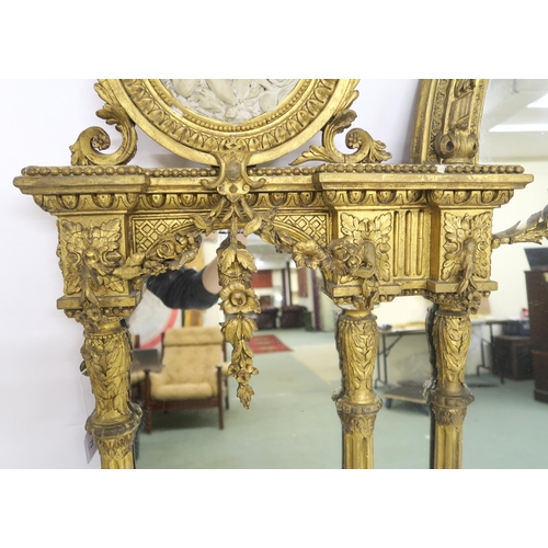 73 - A LARGE 19TH CENTURY GILTWOOD AND GESSO FRAMED ARCHFORM OVERMATLE MIRRORon a later rosewood open bre... 