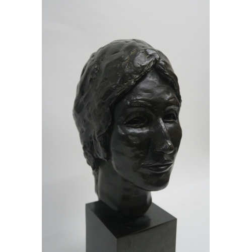 1057 - SCOTTISH SCHOOLFEMALE HEAD WITH A BOW IN HER HAIR Bronze, 51cm high (inc plinth), 34cm (head)&n... 