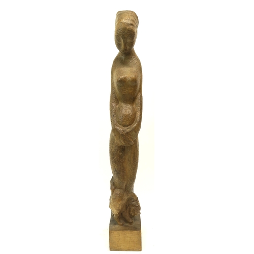 1118 - BRITISH SCHOOL STANDING FEMALE NUDE WITH A CAT AT HER FEET Wood carving, 69cm (high)... 