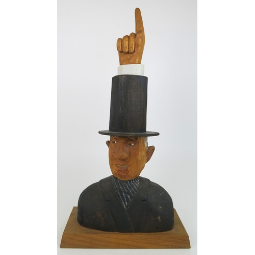 1121 - JOHN BUTLER (BRITISH b.1947)UNDERTAKER (1990)Wood carving, painted and varnished, signed, 60cm high ... 