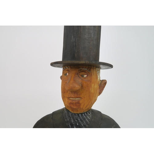 1121 - JOHN BUTLER (BRITISH b.1947)UNDERTAKER (1990)Wood carving, painted and varnished, signed, 60cm high ... 