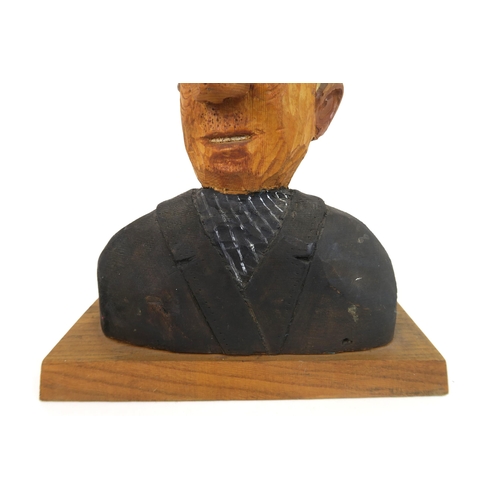 1121 - JOHN BUTLER (BRITISH b.1947)UNDERTAKER (1990)Wood carving, painted and varnished, signed, 60cm high ... 