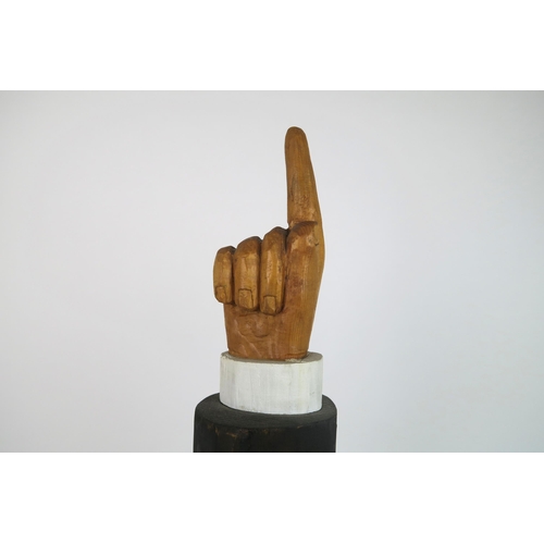 1121 - JOHN BUTLER (BRITISH b.1947)UNDERTAKER (1990)Wood carving, painted and varnished, signed, 60cm high ... 