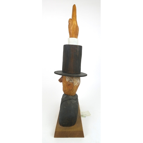 1121 - JOHN BUTLER (BRITISH b.1947)UNDERTAKER (1990)Wood carving, painted and varnished, signed, 60cm high ... 