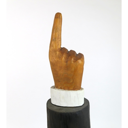 1121 - JOHN BUTLER (BRITISH b.1947)UNDERTAKER (1990)Wood carving, painted and varnished, signed, 60cm high ... 