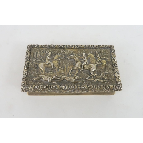 453 - A GEORGIAN SILVER GILT SNUFF BOXof rectangular form, the cover with a relief fox hunting scene surro... 