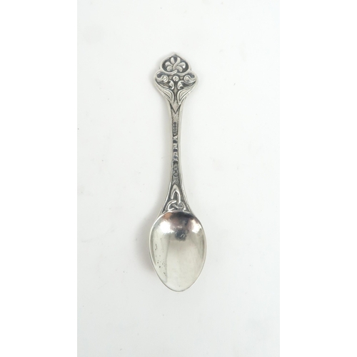 479 - AN ALEXANDER RITCHIE TEA SPOONthe terminal with a triquetra above the bowl, decorated with a celtic ... 