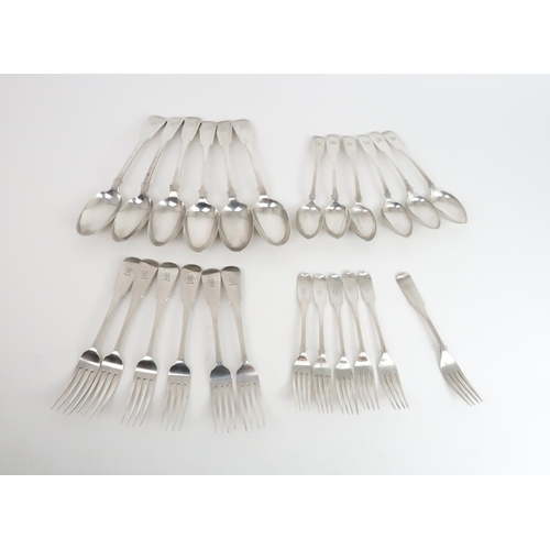 490 - A SELECTION OF SILVER CUTLERYincluding a set of William IV fiddle pattern dessert spoons, the finial... 