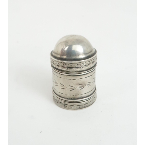 514 - A GEORGE III SILVER NUTMEG GRATERthe cylindrical body with bright cut engraved decoration and a lift... 