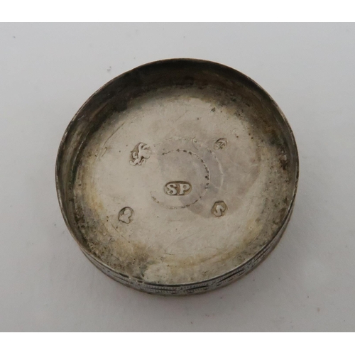 514 - A GEORGE III SILVER NUTMEG GRATERthe cylindrical body with bright cut engraved decoration and a lift... 