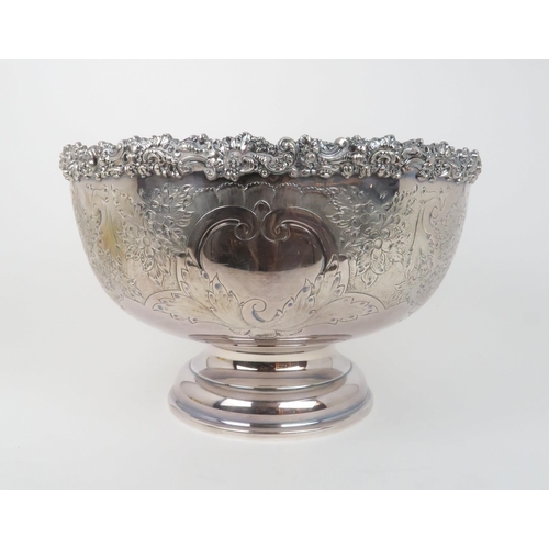 515 - AN IMPRESSIVE SILVER PLATED PUNCH  SETcomprising a footed bowl, twelve cups, a lobed ladle and stand... 