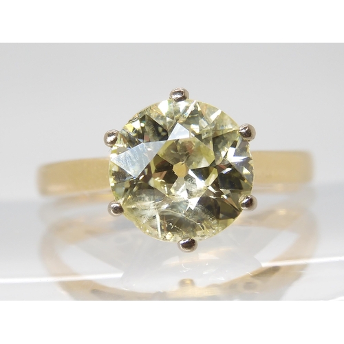 870 - A SUBSTANTIAL YELLOW DIAMOND SOLITAIREin an 18ct gold mount. Approximate dimensions of the diamond 8... 