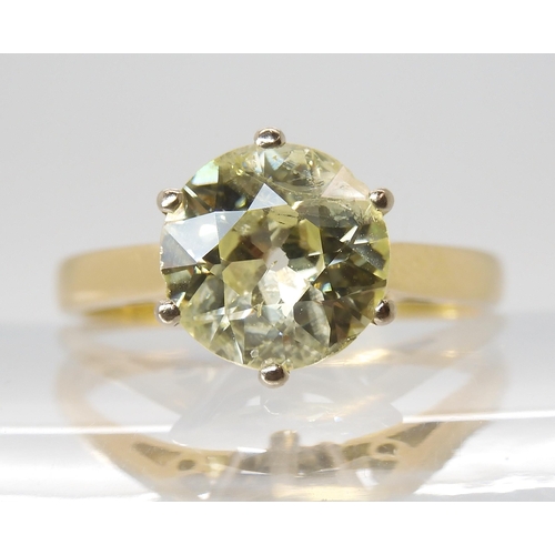 870 - A SUBSTANTIAL YELLOW DIAMOND SOLITAIREin an 18ct gold mount. Approximate dimensions of the diamond 8... 