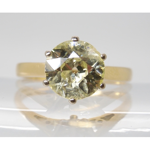 870 - A SUBSTANTIAL YELLOW DIAMOND SOLITAIREin an 18ct gold mount. Approximate dimensions of the diamond 8... 