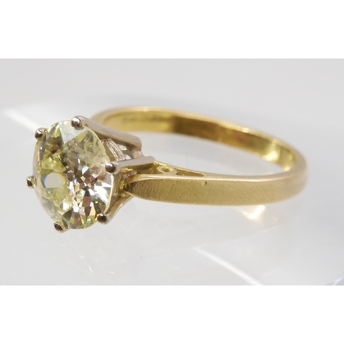 870 - A SUBSTANTIAL YELLOW DIAMOND SOLITAIREin an 18ct gold mount. Approximate dimensions of the diamond 8... 