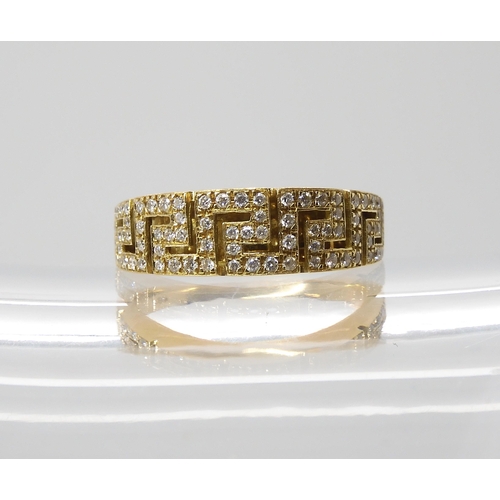 865 - AN 18CT GOLD KEY PATTERN DIAMOND RINGmade by Italian designer Leo Pizzo, finger size P, weight 5.6gm... 