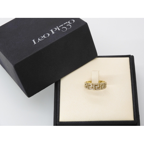 865 - AN 18CT GOLD KEY PATTERN DIAMOND RINGmade by Italian designer Leo Pizzo, finger size P, weight 5.6gm... 