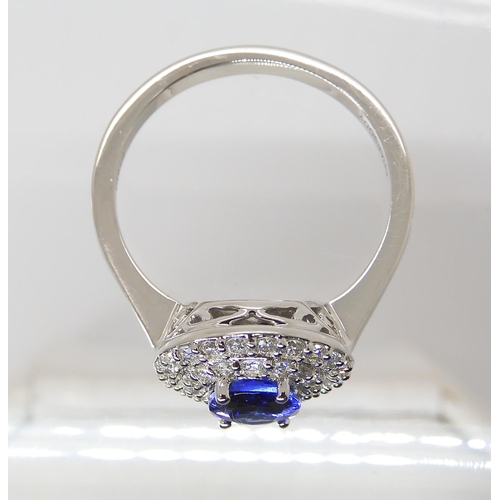 869 - A TANZANITE AND DIAMOND RINGfrom the Rhapsody Collection for The Jewellery Channel. The Central oval... 