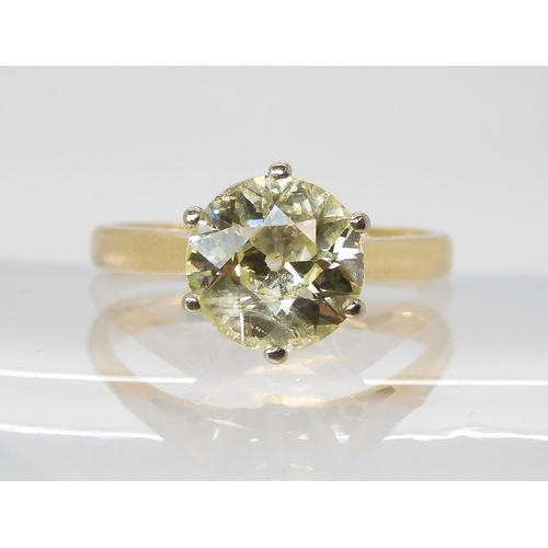 870 - A SUBSTANTIAL YELLOW DIAMOND SOLITAIREin an 18ct gold mount. Approximate dimensions of the diamond 8... 