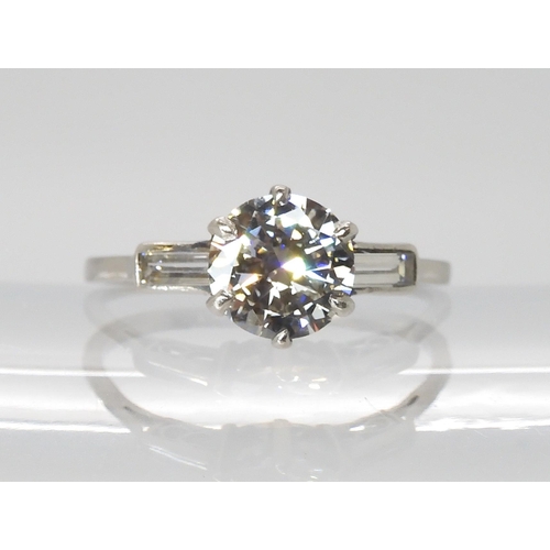 873 - *WITHDRAWN A PLATINUM DIAMOND RINGset with an old brilliant cut, with the approx dimensions of 7.30 ... 