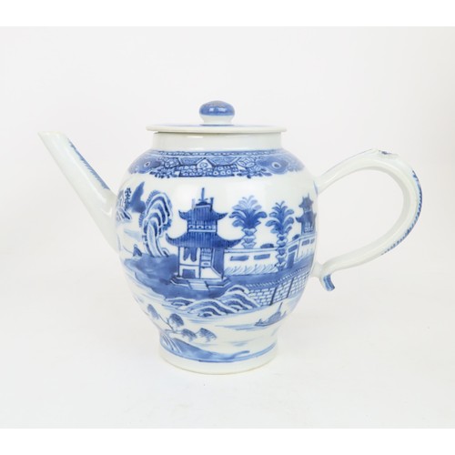 414 - A PAIR OF CHINESE BLUE AND WHITE VASES AND COVERSpainted with fruit and foliage, with shishi finials... 