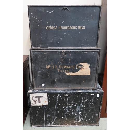 104 - A lot of three black painted metal deed boxes and a mahogany glazed bookcase top (4)